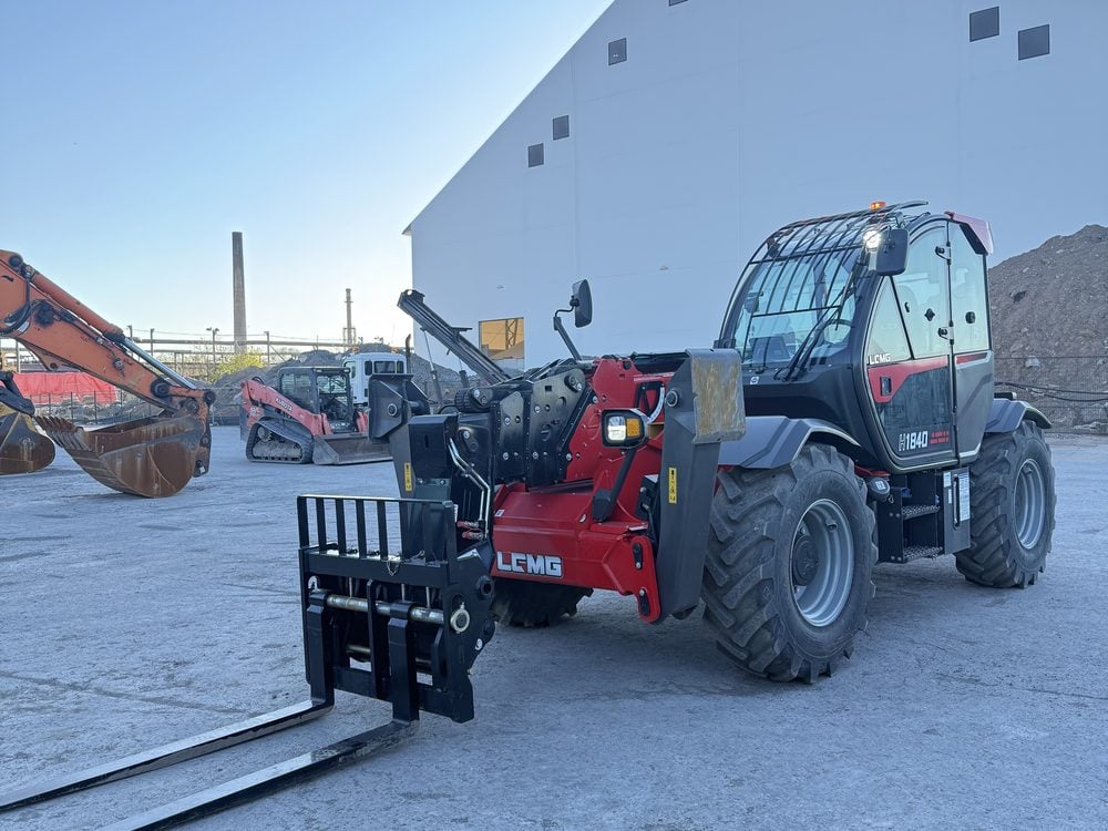 Telehandler and lifts lined up at the yard