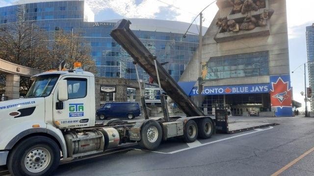 GTA Equipment Rentals float truck parked outside Rogers Centre in downtown Toronto